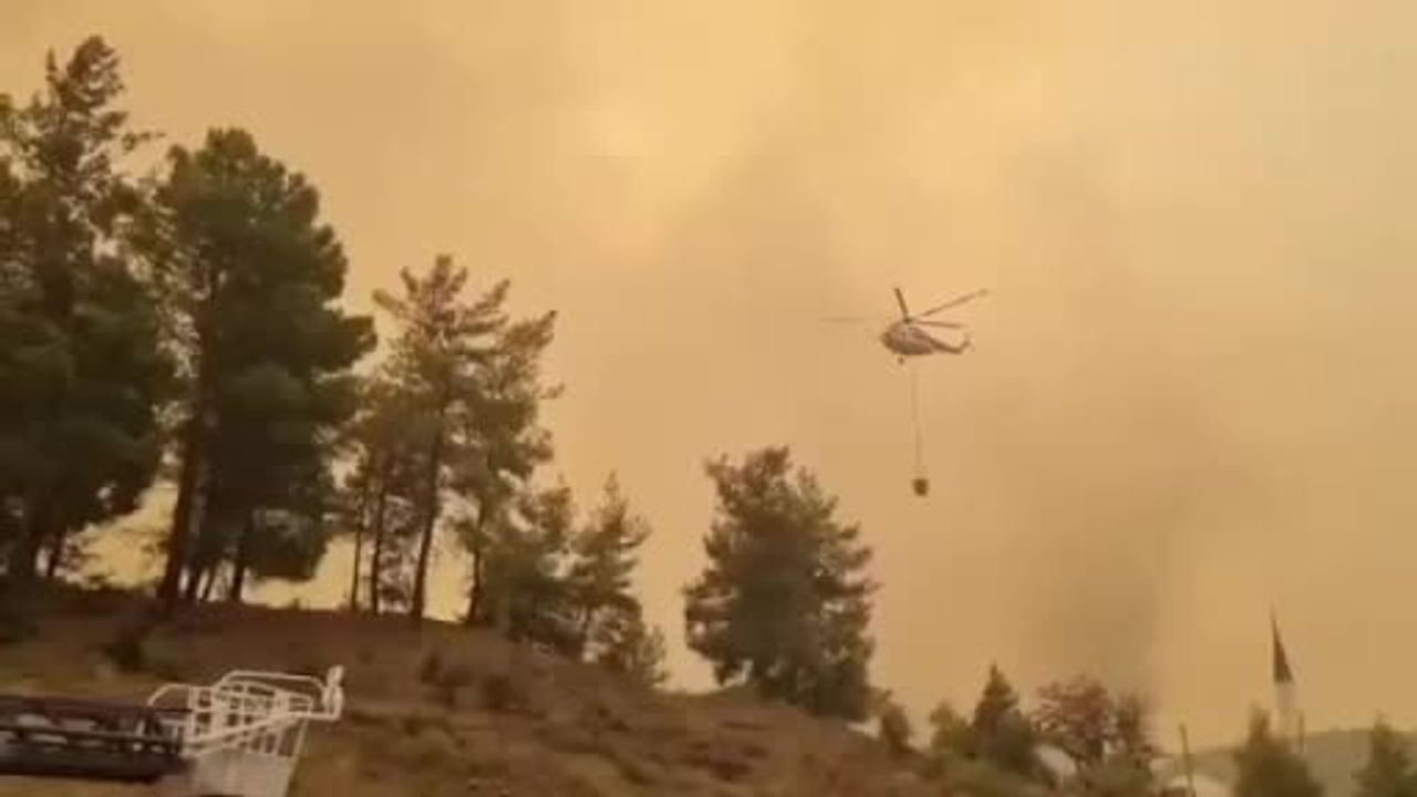 Muğla’daki orman yangınına 5 uçak ve 18 helikopterle müdahale sürüyor