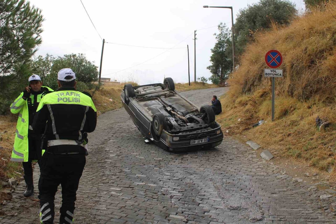 EFELER İLÇESİNDE FRENİ TUTMAYAN OTOMOBİL TAKLA ATTI