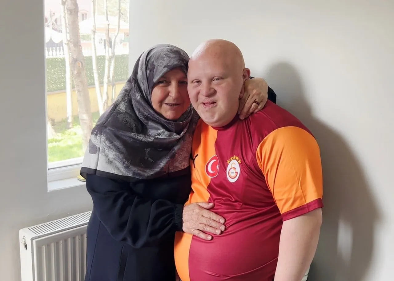 ERZURUM’DA YAŞAYAN 52 YAŞINDAKİ NURAN SAĞLAM, 20 YAŞINDAKİ DOWN SENDROMLU OĞLU MUHAMMET HANİFİ...
