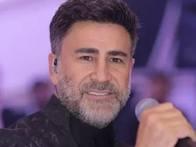 İzzet Yıldızhan'ın 23 yıldır sır gibi sakladığı eşi ortaya çıktı! O pozları olay oldu: ''Çok güzel kadın''