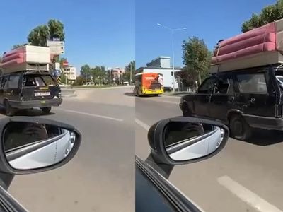 Bursa'da skandal görüntüler: Ehliyetsiz sürücü otomobilin tavanında koltuk taşıdı! Trafikten men edildi