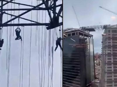 İnşaat iskelesi bir anda çöktü: 150 metre yüksekte asılı kaldılar