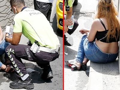 Taksim’de Sinir Krizi Geçiren Turist Kadın Tartıştığı Taksicinin Arabasını Yumruklayıp Tekmeledi
