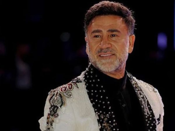 İzzet Yıldızhan'ın 23 yıldır sır gibi sakladığı eşi ortaya çıktı! O pozları olay oldu: ''Çok güzel kadın''