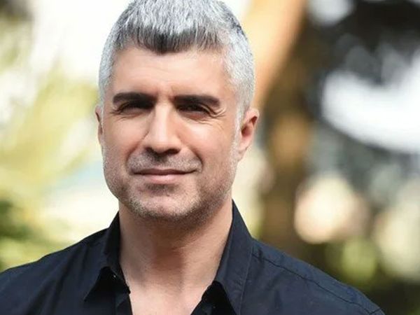 Özcan Deniz'den Sevgilisine Büyük Jest Yanına Aldırdı!