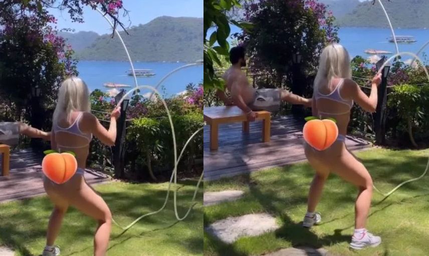 Ece Seçkin tangasıyla spor yaptı kendi kalçasına uyguladığı şeftali sansürü olay oldu!