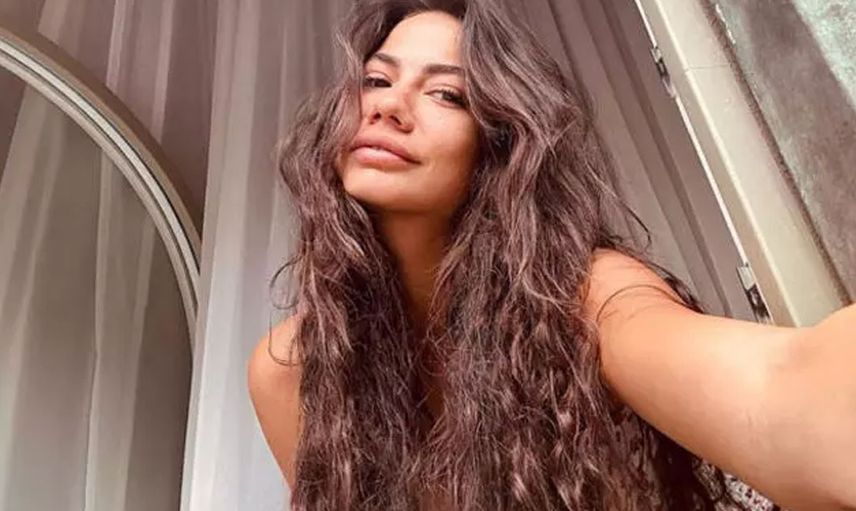 Oğuzhan Koç’tan yeni boşanmıştı: Demet Özdemir’den dudak dudağa paylaşım