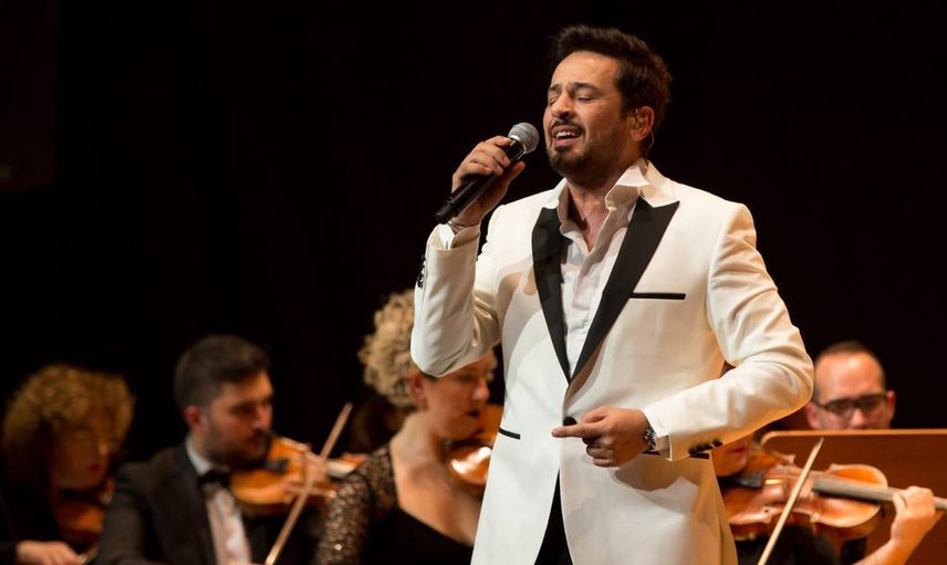Emre Altuğ kimdir?