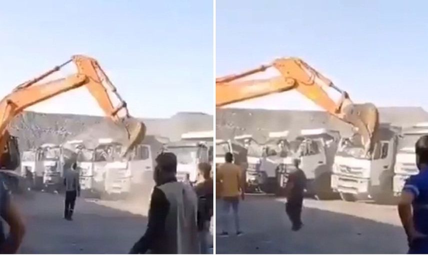 Parasını alamayan adam amcasının kamyonlarını kepçeyle ezdi
