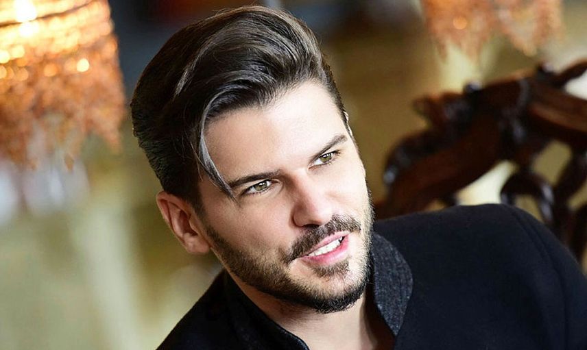 Tolgahan Sayışman kimdir?