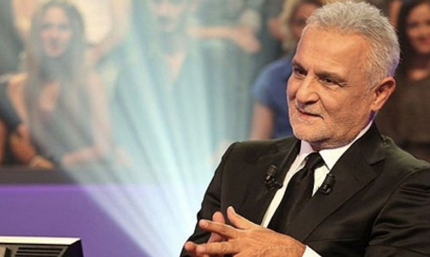 Kenan Işık Kimdir? 