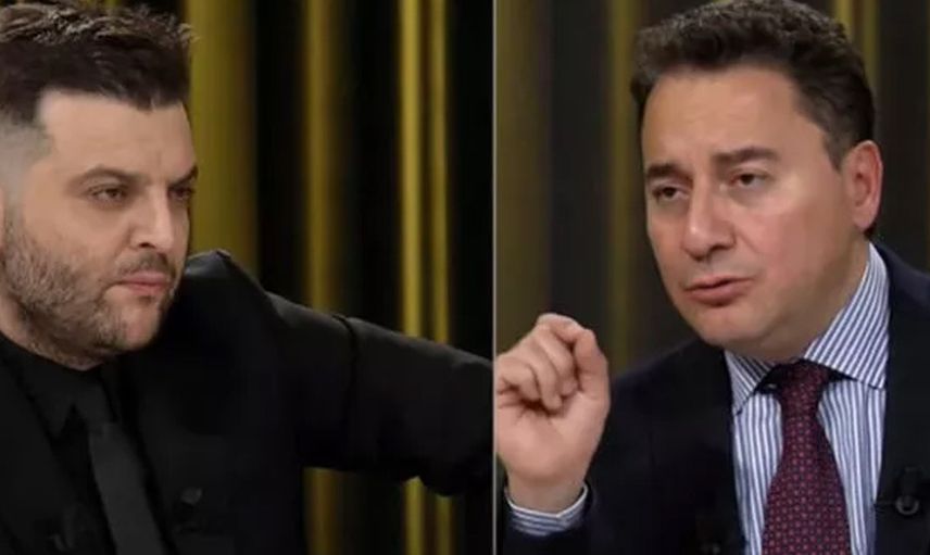 Candaş Tolga Işık'ın programında gergin anlar! Canlı yayında cüzdanını çıkardı