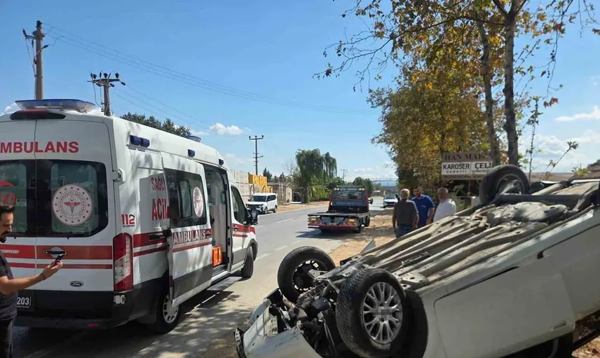 Bursa'da otomobil takla attı: Baba-oğul kazayı hafif yaralarla atlattı