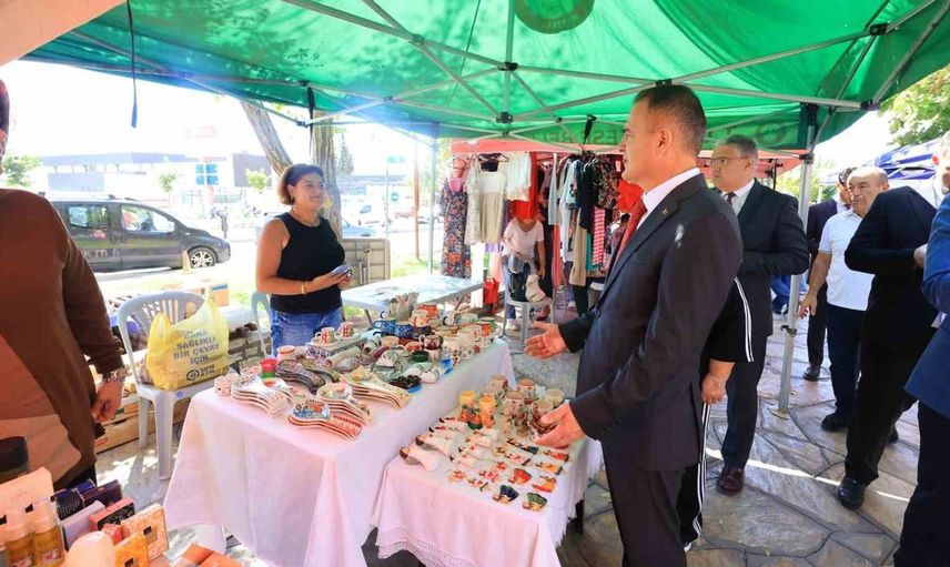 Muğla valisi, kadınların dayanışma projesi mor pazarı ziyaret etti