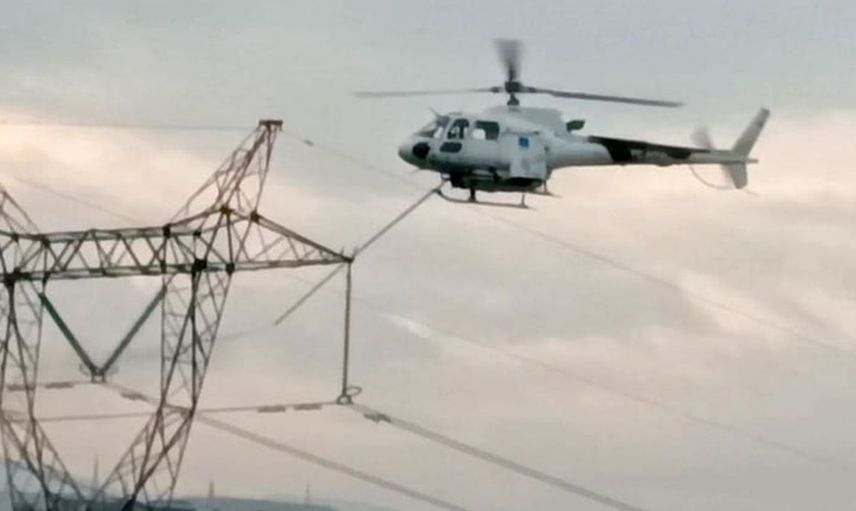 Bursa'da elektrik hatları için helikopterli bakım çalışması dikkat çekti