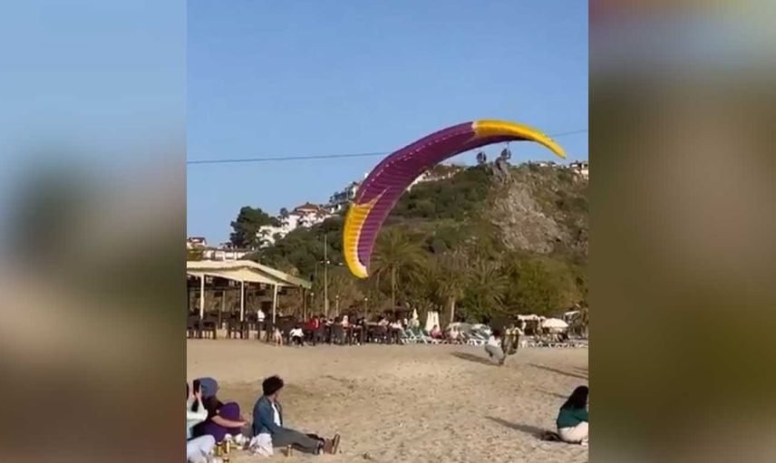 Antalya'da akılalmaz olay:  Kadın turistin üzerine yamaç paraşütçüsü düştü