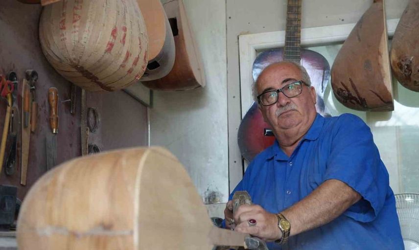 Bağlama ustası Enver Arslanyürek, yıllardır üretim yapsa da çalamıyor