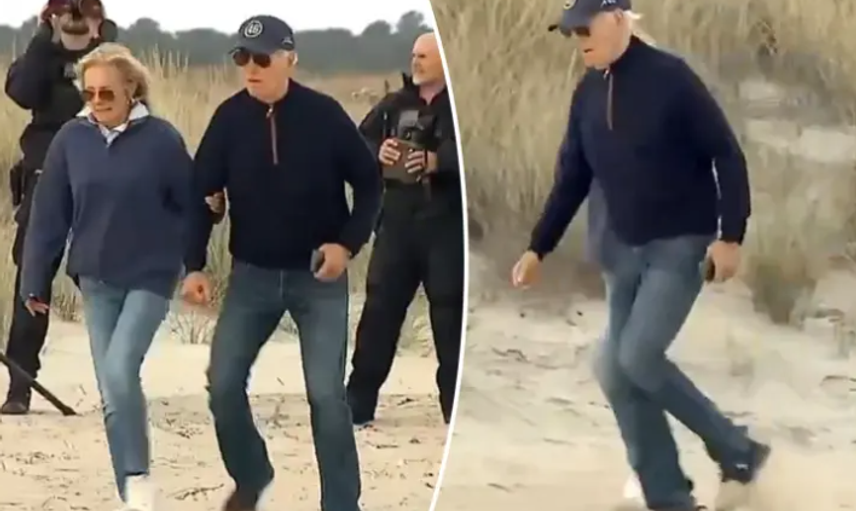 Joe Biden kumlu Delaware plajında yürümekte zorlandı
