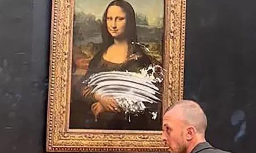 Leonardo da Vinci'nin başyapıt eseri Mona Lisa tablosuna kremalı pasta ile protesto!