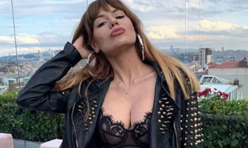 Nihal Candan'ın havuz başı pozu sosyal medyayı salladı! Candan kırmızı bikinisiyle adeta ateş saçtı